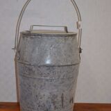 Zinc basin with a faucet