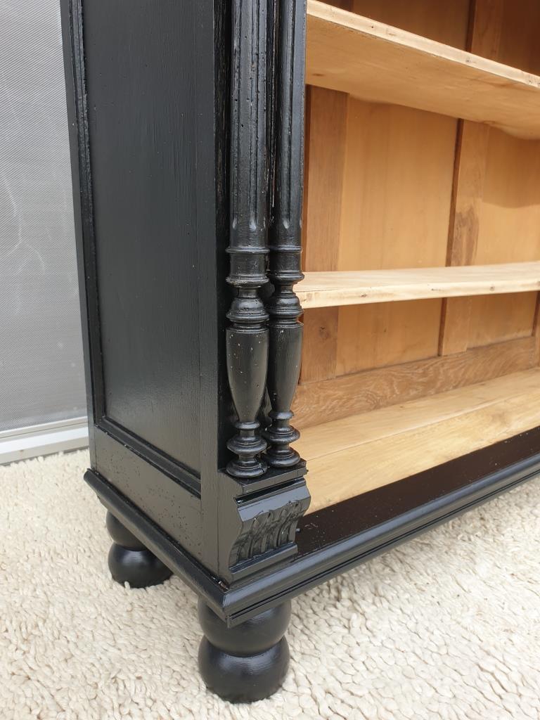 Neoclassical black wood bookcase with columns