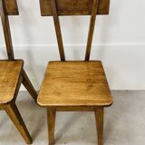 6 brutalist solid wood chairs