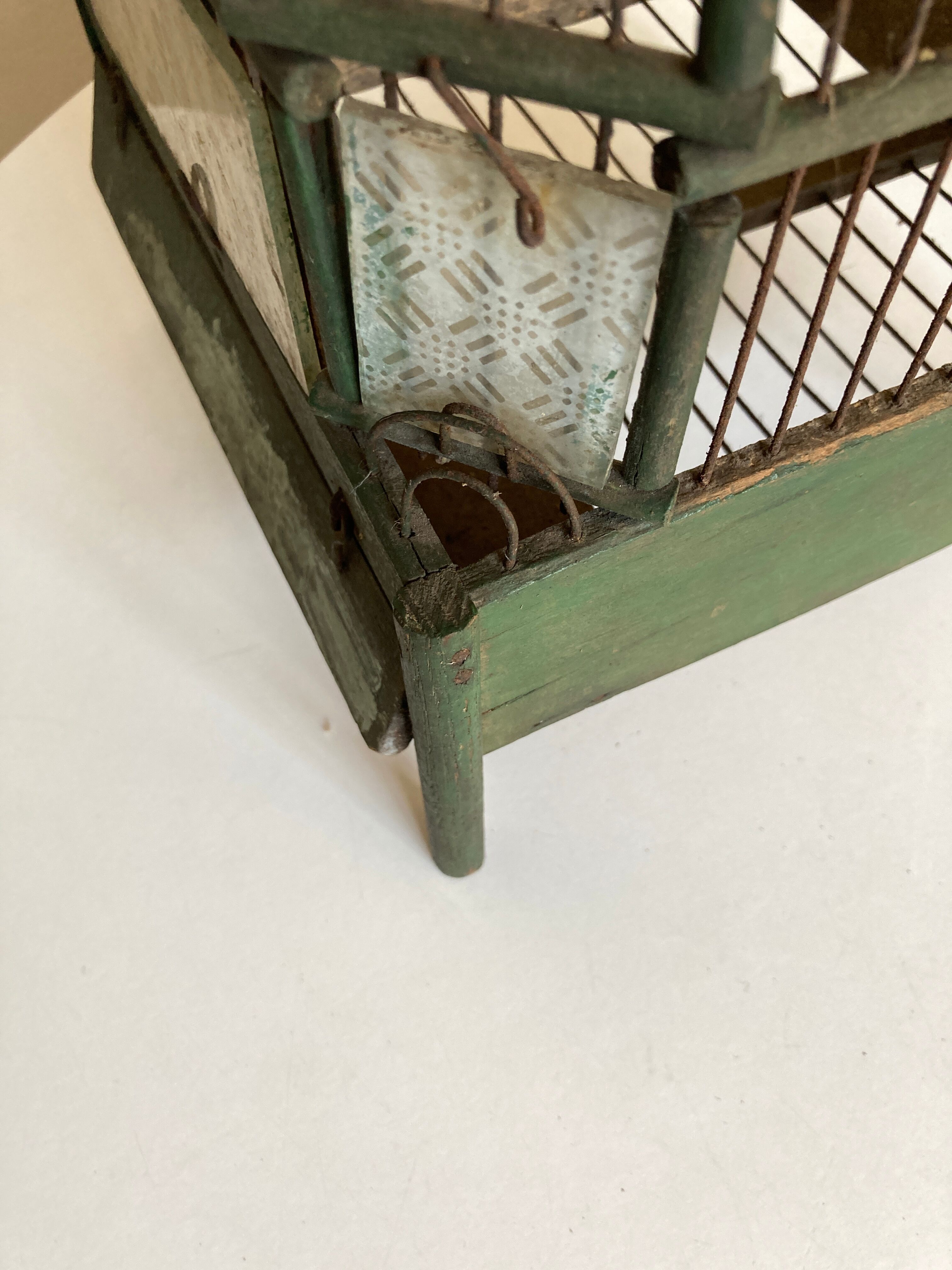 Octagonal bird cage made of wood and wire around 1920