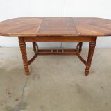 Oval table, integrated extension, in exotic wood