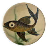Small fish dish signed by Puigdemont