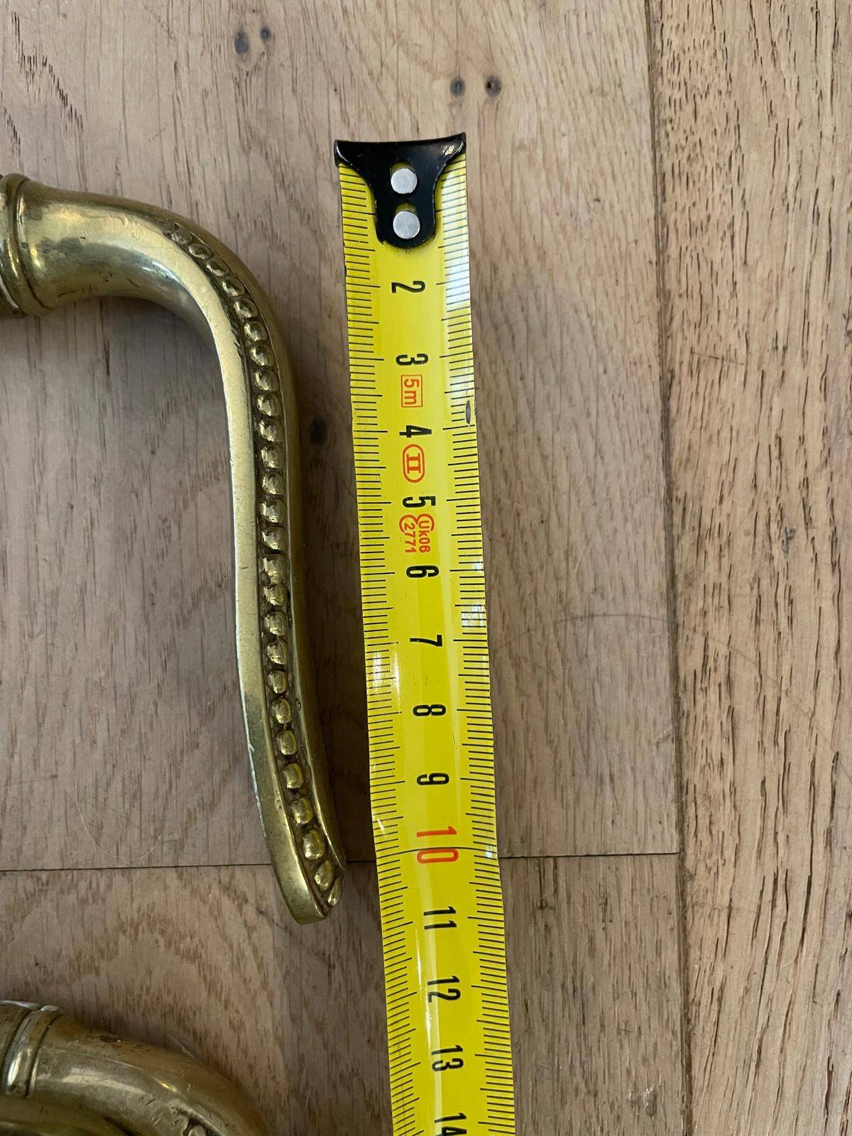 Set of 7 solid brass door handles