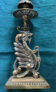 Antique chandelier in gilded bronze with winged dragon