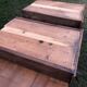 Antique farmhouse table in solid cherry wood with 2 drawers and 1 pull-out at the end with turned legs.