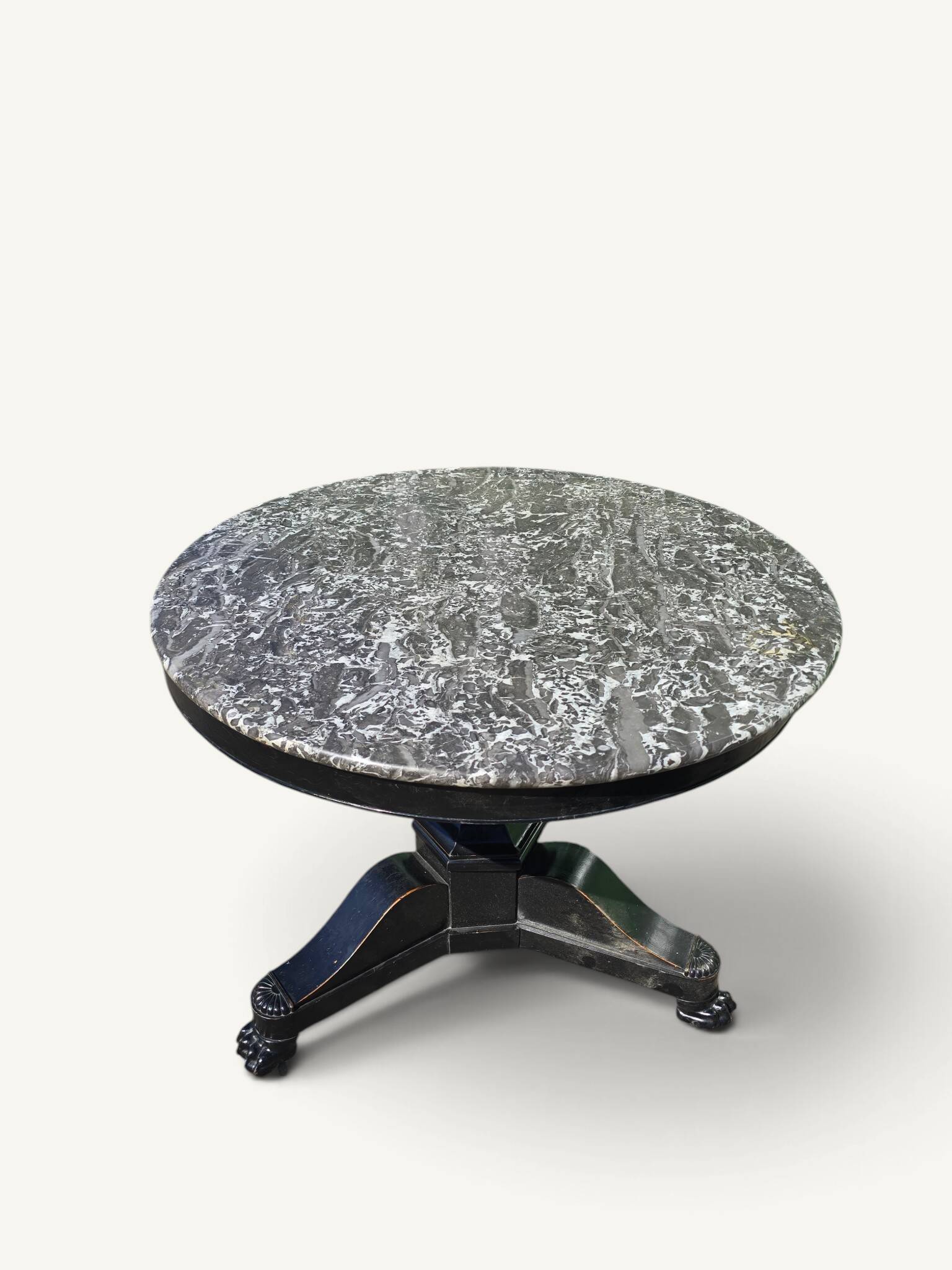 Empire dining table in blackened wood and grey marble, 19th century.