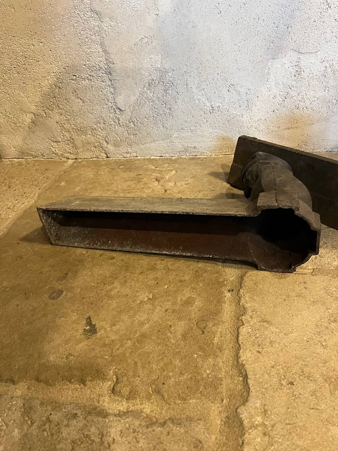 Pair of cast iron andirons with face