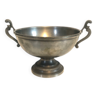 Old pewter cup punched