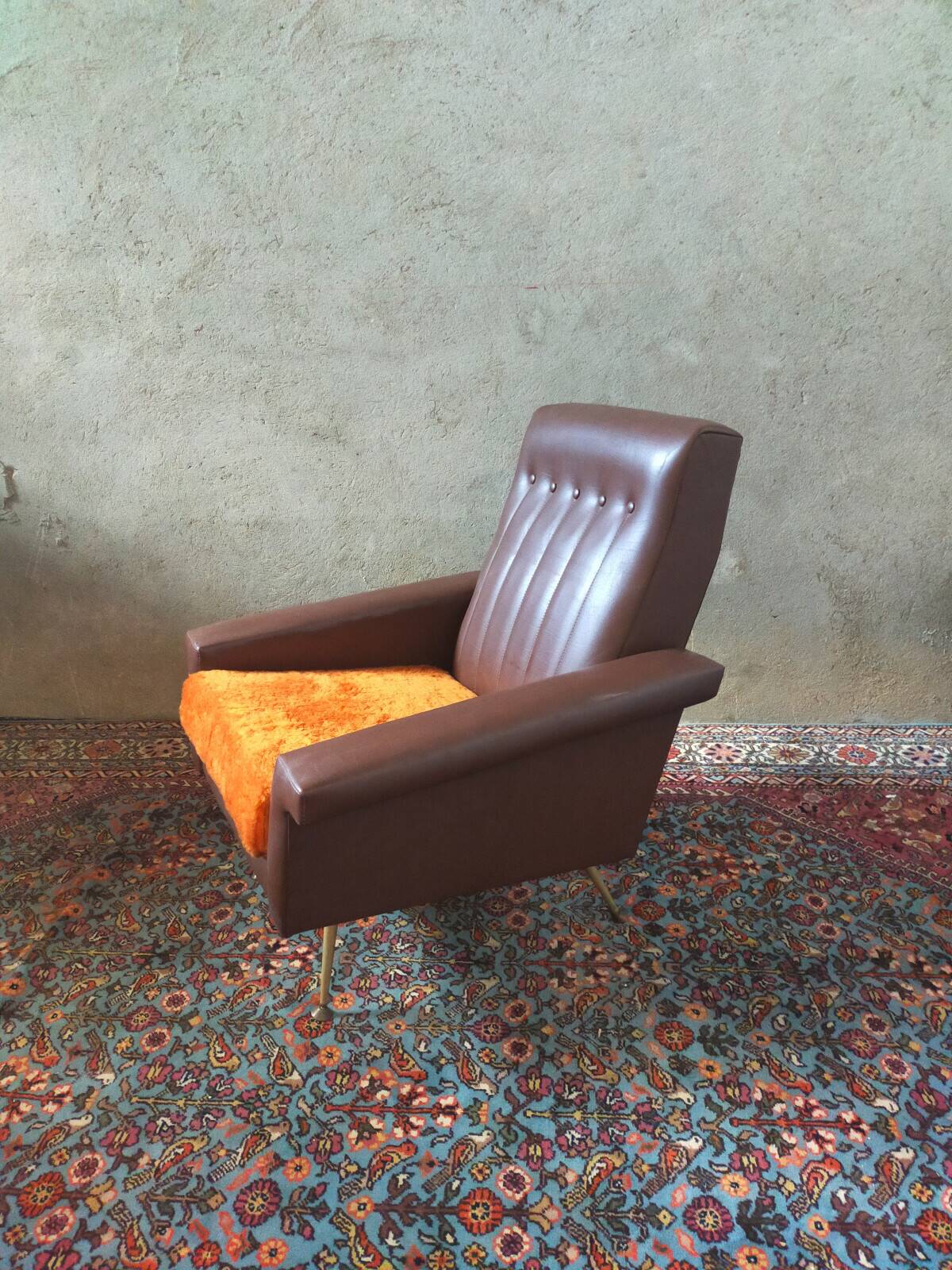 Vintage armchair in faux leather