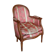 Pair of Louis XVI style armchairs in walnut and pink silk and ecru