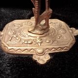 Pair of bronze candle holders decorated with herons