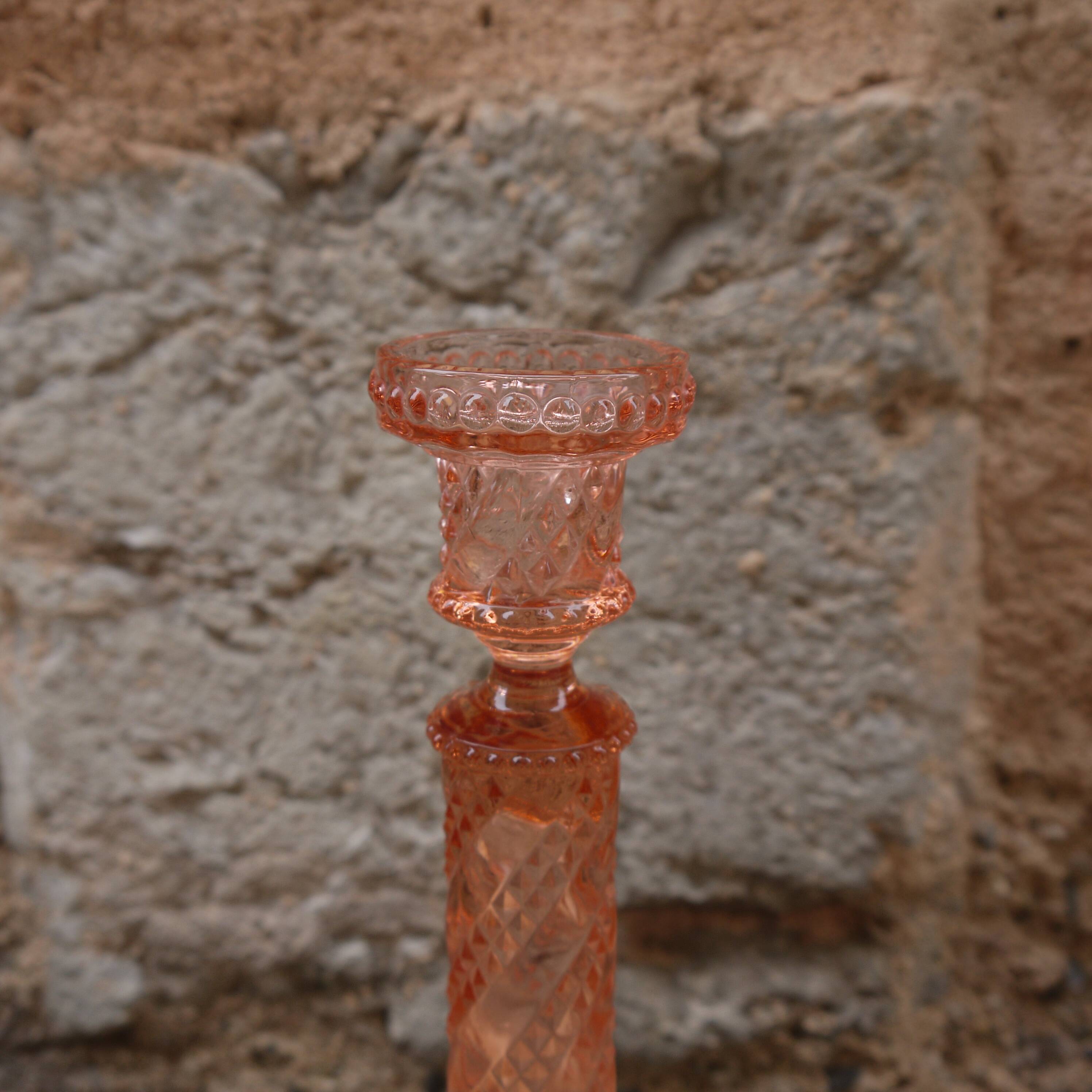 Pink glass candlestick