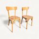Pair of vintage bistro chairs in golden oak.