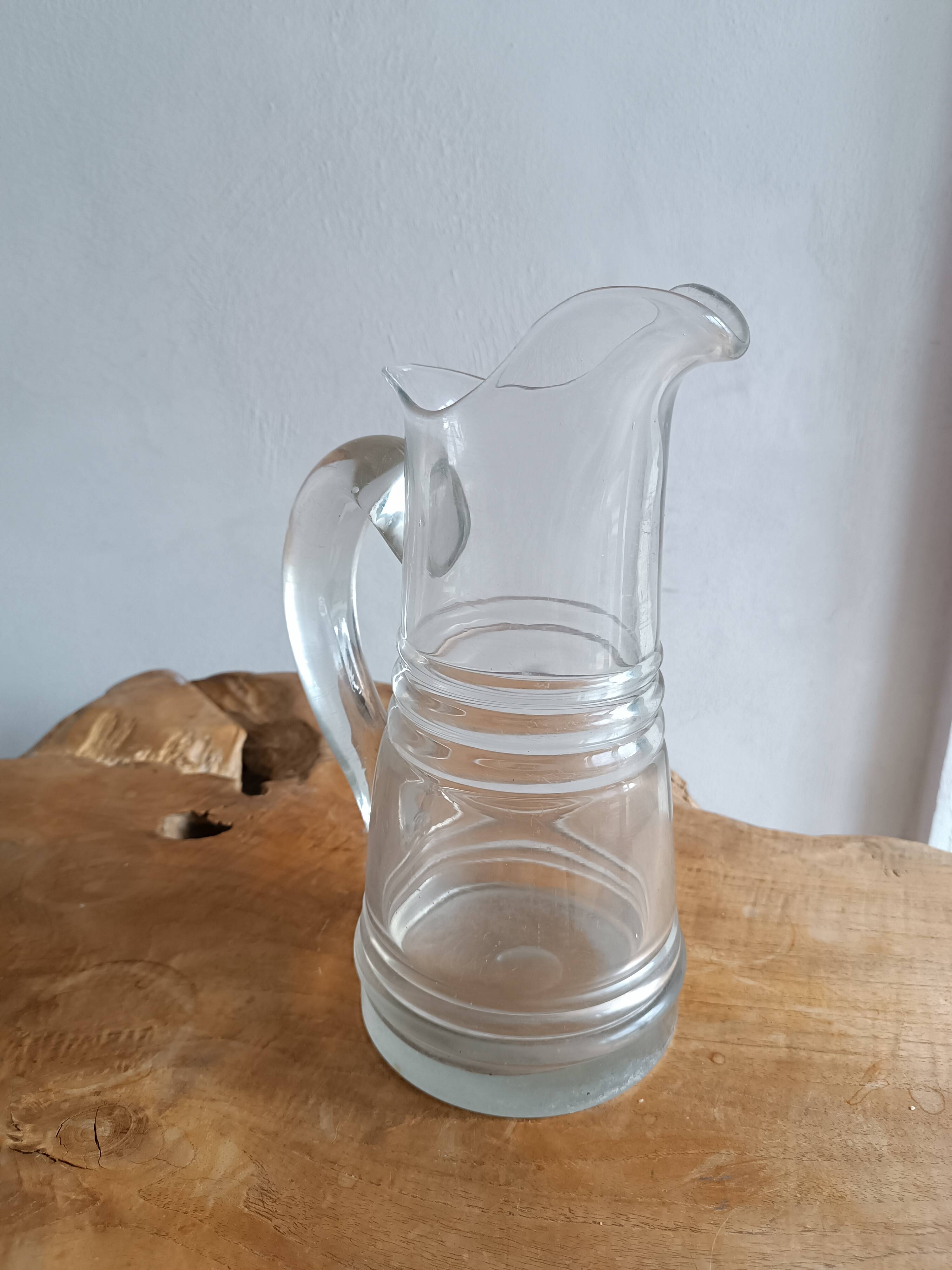 Large Normandy cider pitcher in blown glass, 19th century