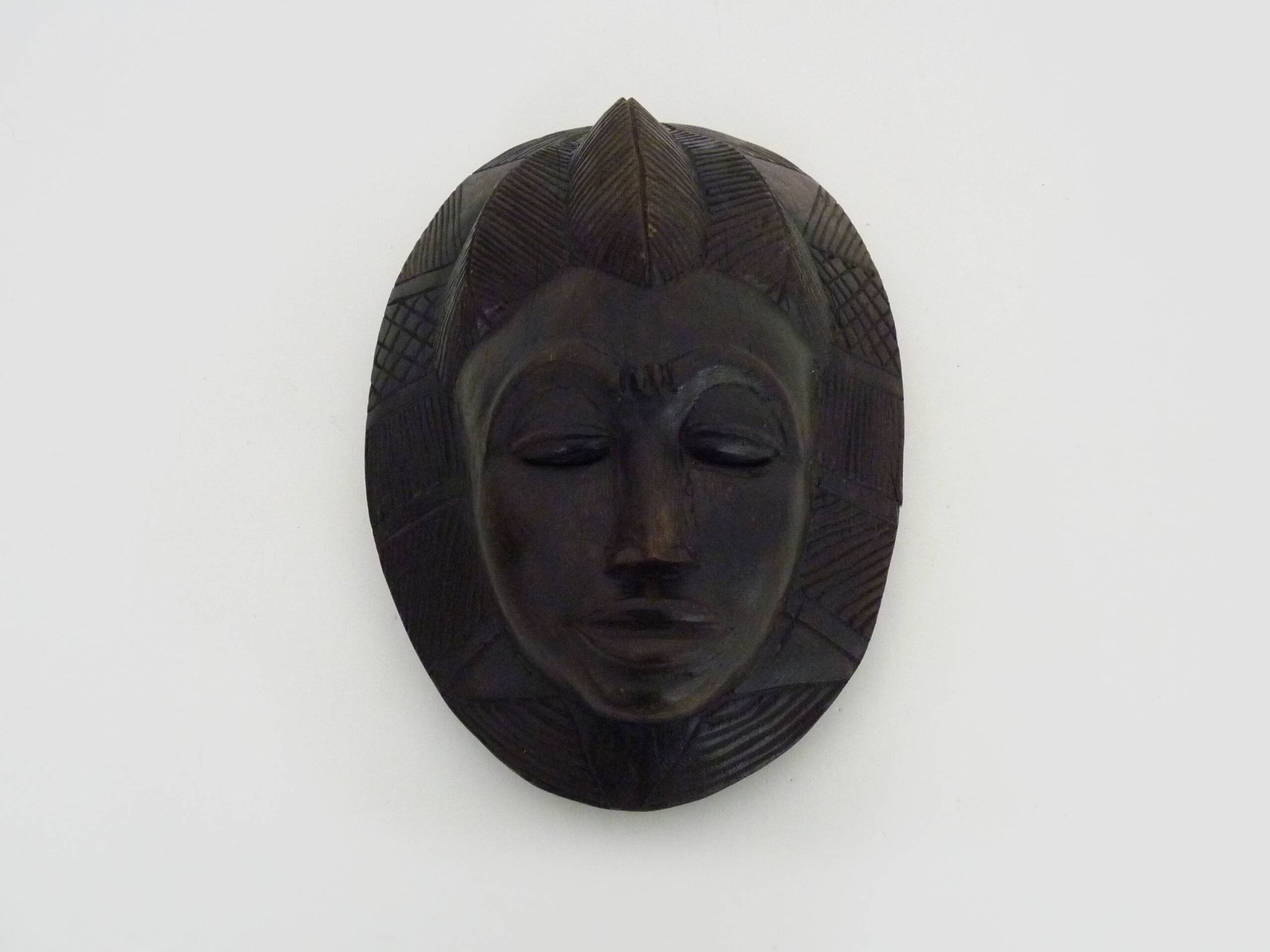 Wooden mask of the Baoulé ethnic group from Ivory Coast. African mask