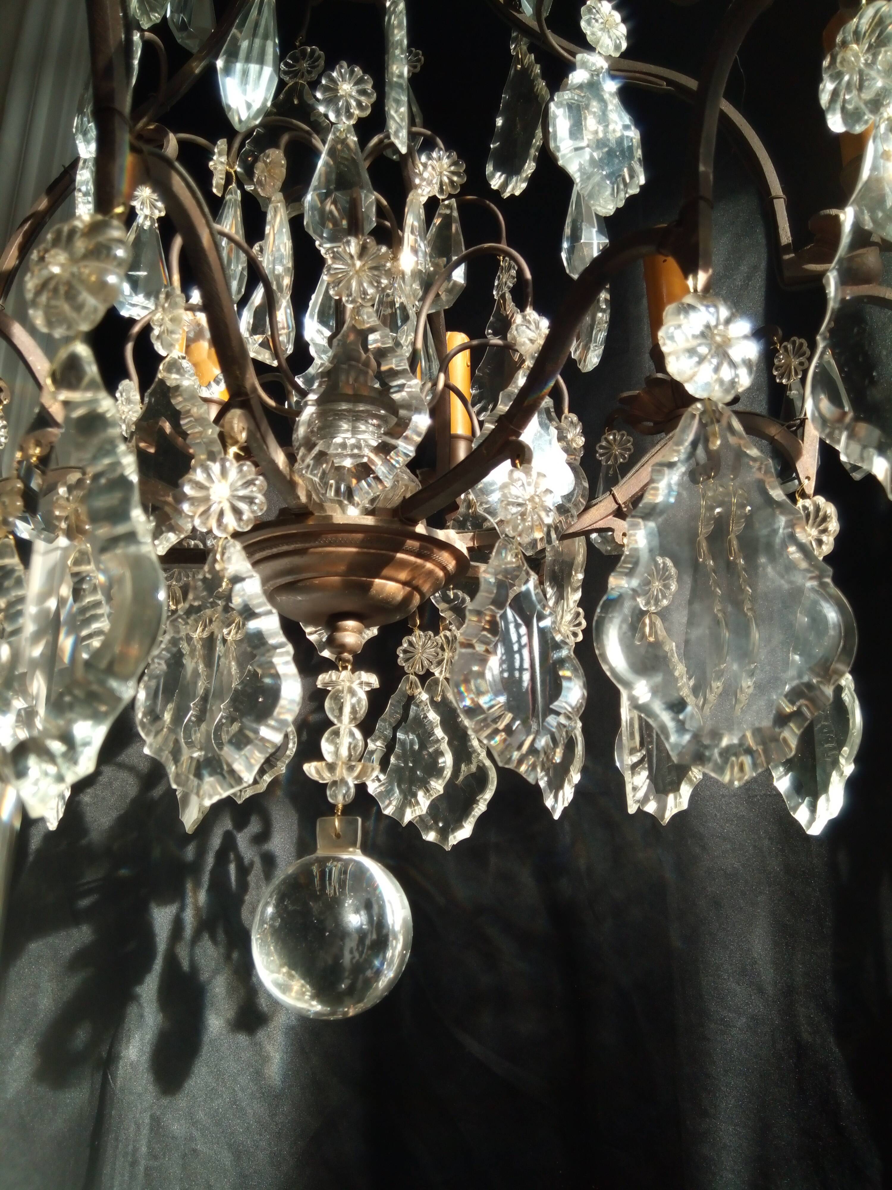 Old chandelier with tassels, bronze and crystal, 8 lights. Louis XV style.