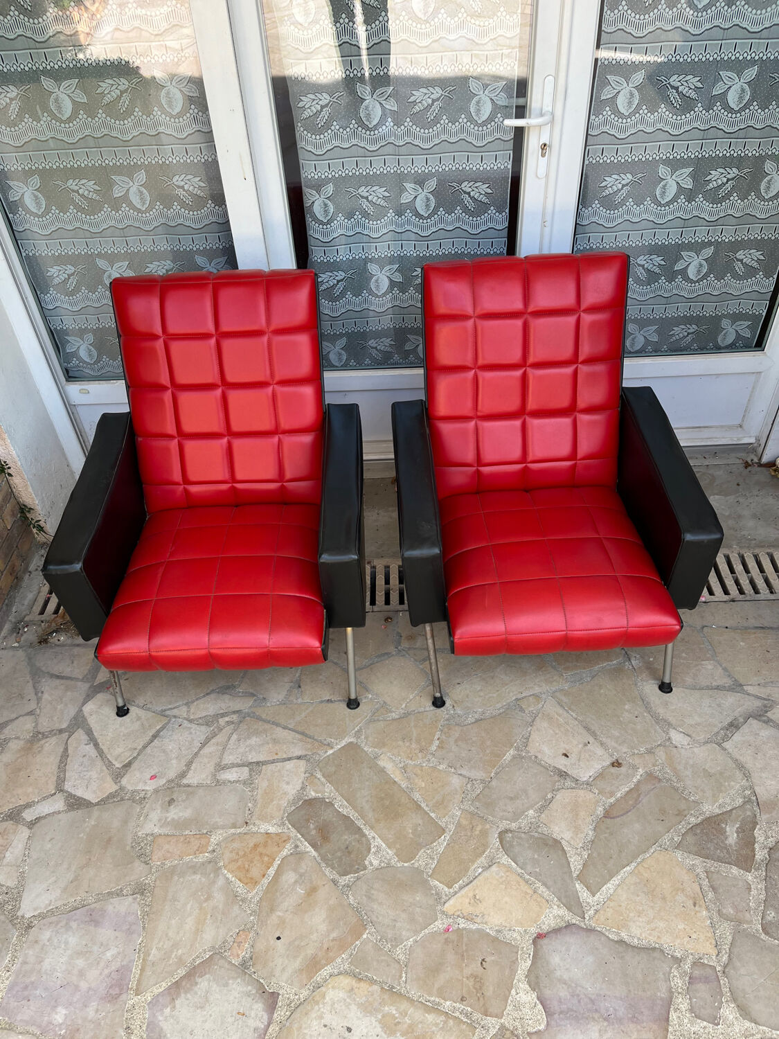 Pair of vintage armchairs in red and black Skai