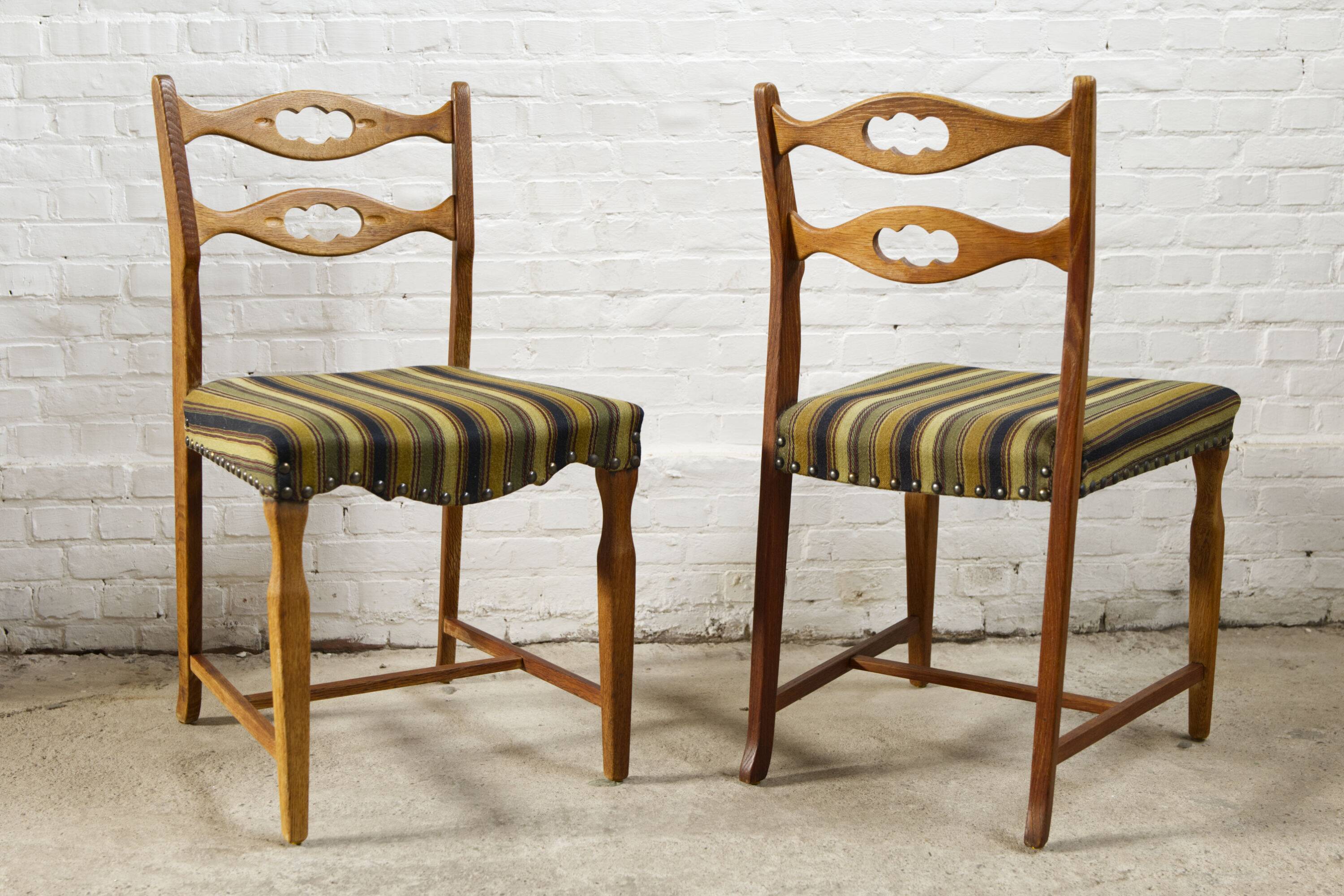Set of four oak and wool dining room chairs by Henning Kjaernulf, 1960's