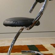 Cobra chairs in steel and black leather by Giotto Stoppino, 1970s, set of 5.
