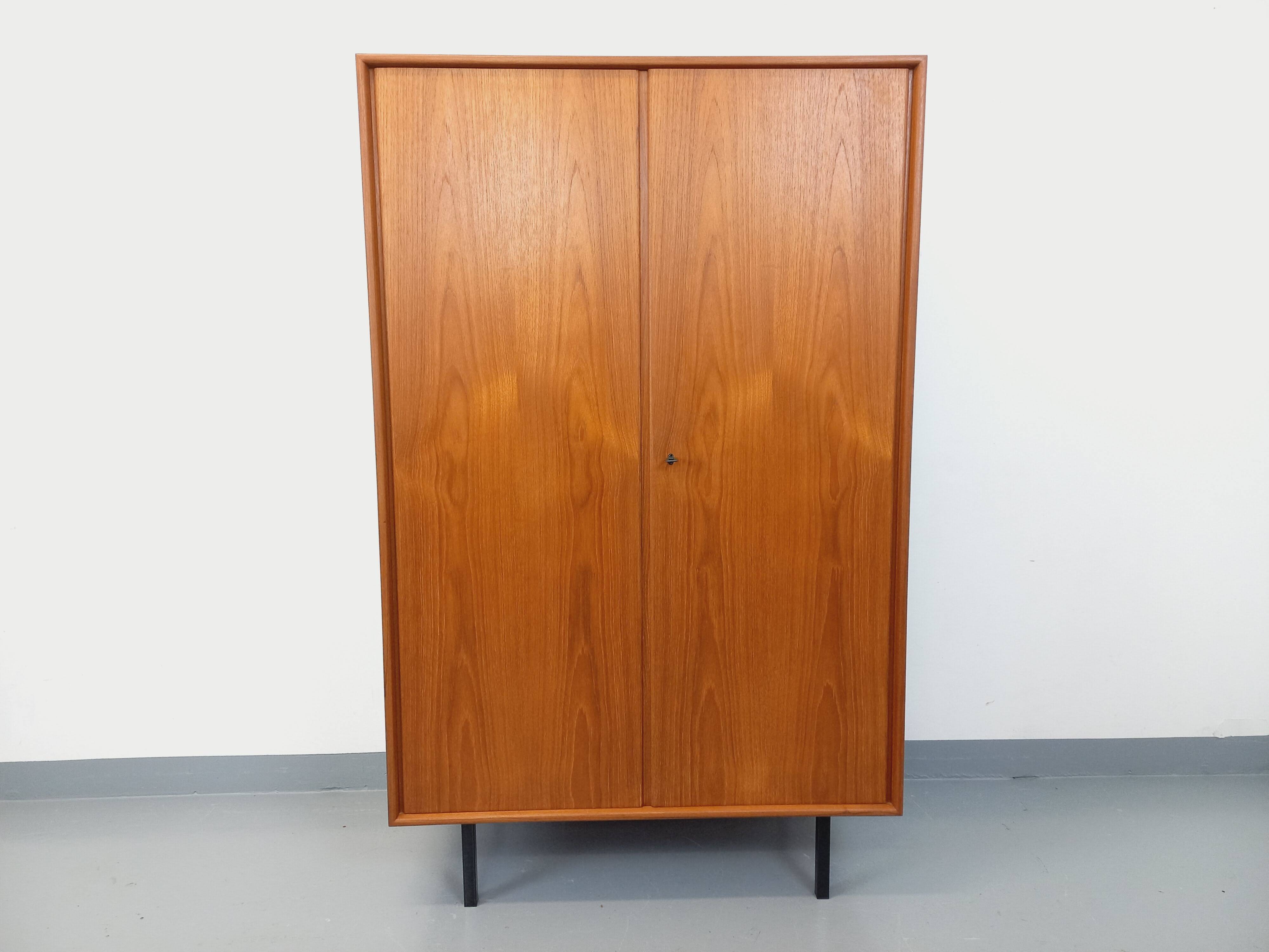 Vintage Scandinavian modernist wardrobe in teak and metal from the 1960s.