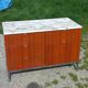 Florence Knoll buffet in wood and marble with chrome legs from the 1970s.