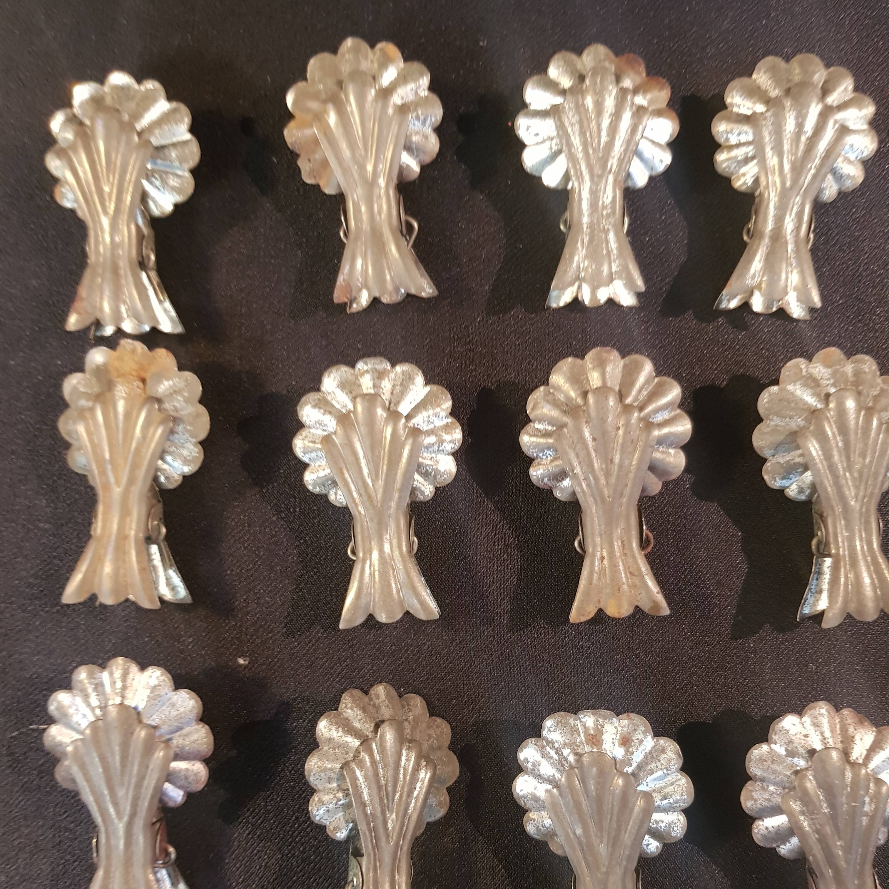 Set of 23 candle tongs