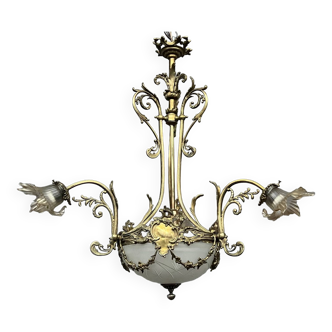 Lustre de style Louis XV. Bronze massif, cristal.