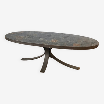 Oval brutalist coffee table in slate and steel base