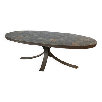 Oval brutalist coffee table in slate and steel base