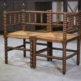 Pair of turned wooden corner chairs from the 1950s.