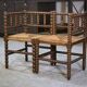 Pair of turned wooden corner chairs from the 1950s.