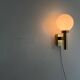 Large minimalist cinema wall light in opal glass and heavy brass, 1960s, Germany