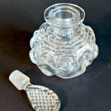 Old perfume bottle in molded