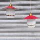 Pair of enamelled sheet metal and glass pendant lights