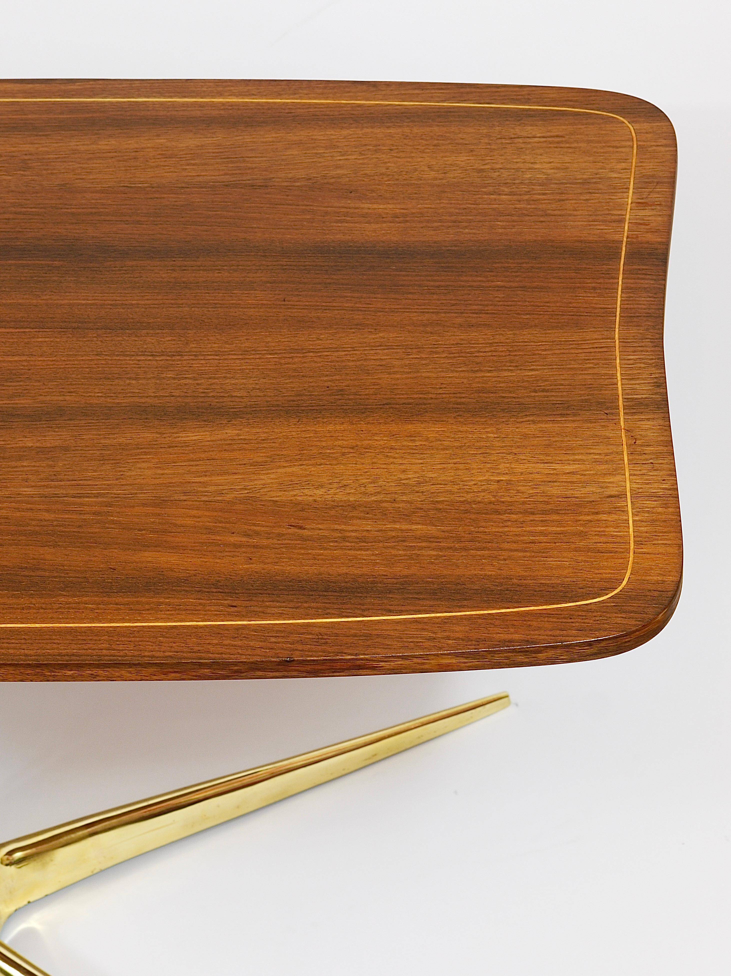 Oswald Haerdtl x Hagenauer Vienna coffee table in brass and walnut, Austria, 1950s