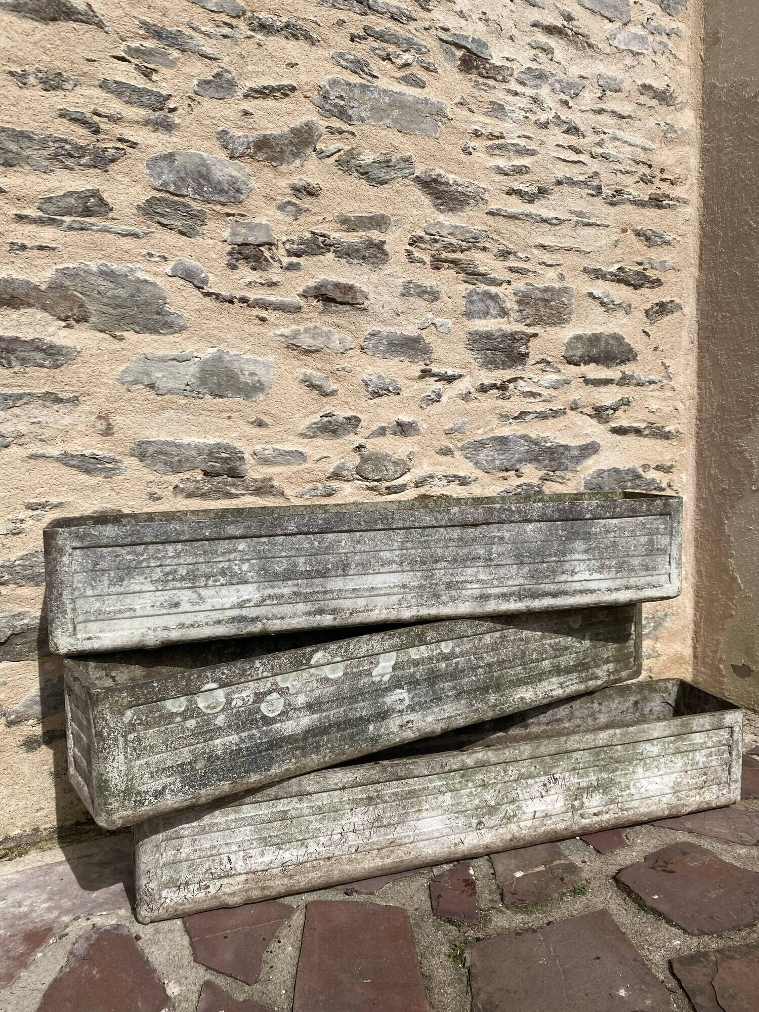 Three fibro cement or eternite planters
