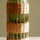 Glass bottle covered with wicker, France of the 60