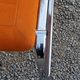 Pair of designer armchairs in orange fabrics and chrome tubes from the 70s