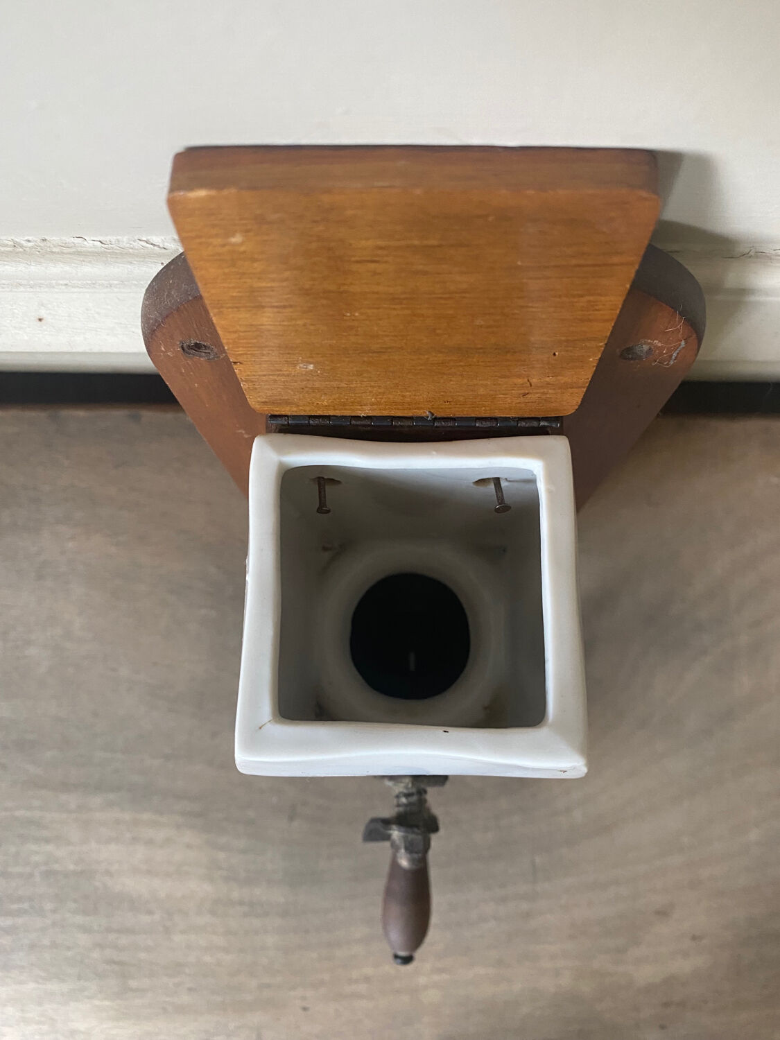 Old wall-mounted coffee grinder