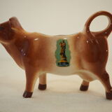 Milk jar in the shape of a vintage ceramic cow