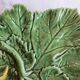 Presentation dish in green slipware