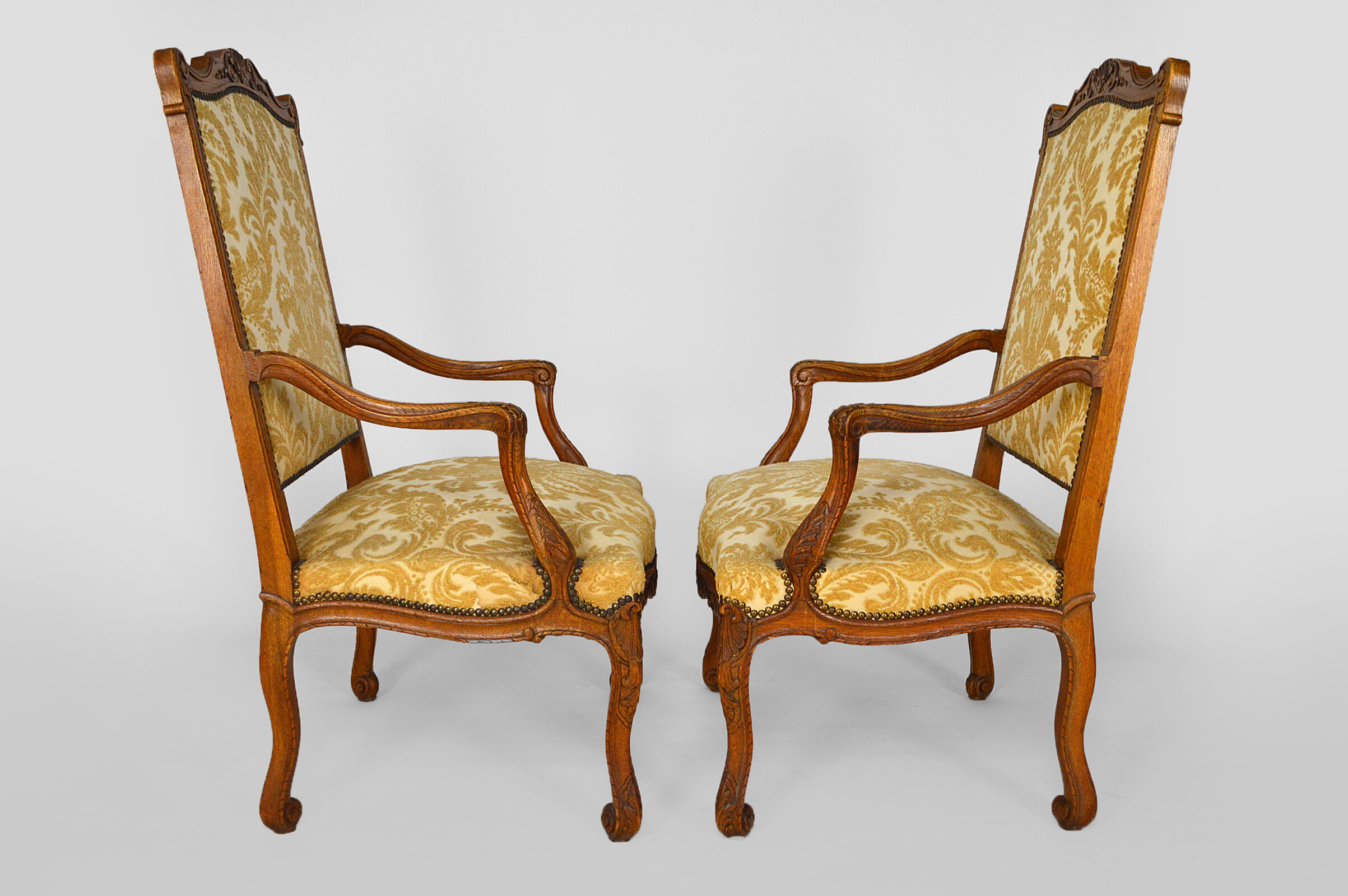 Set of 2 armchairs in carved oak, Louis XV style