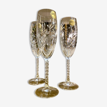 Set of 4 Arques crystal champagne flutes