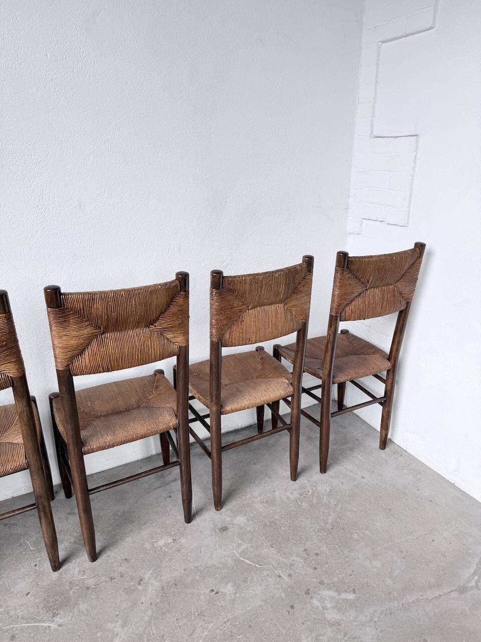 Set of 6 straw and oak Beauche chairs.