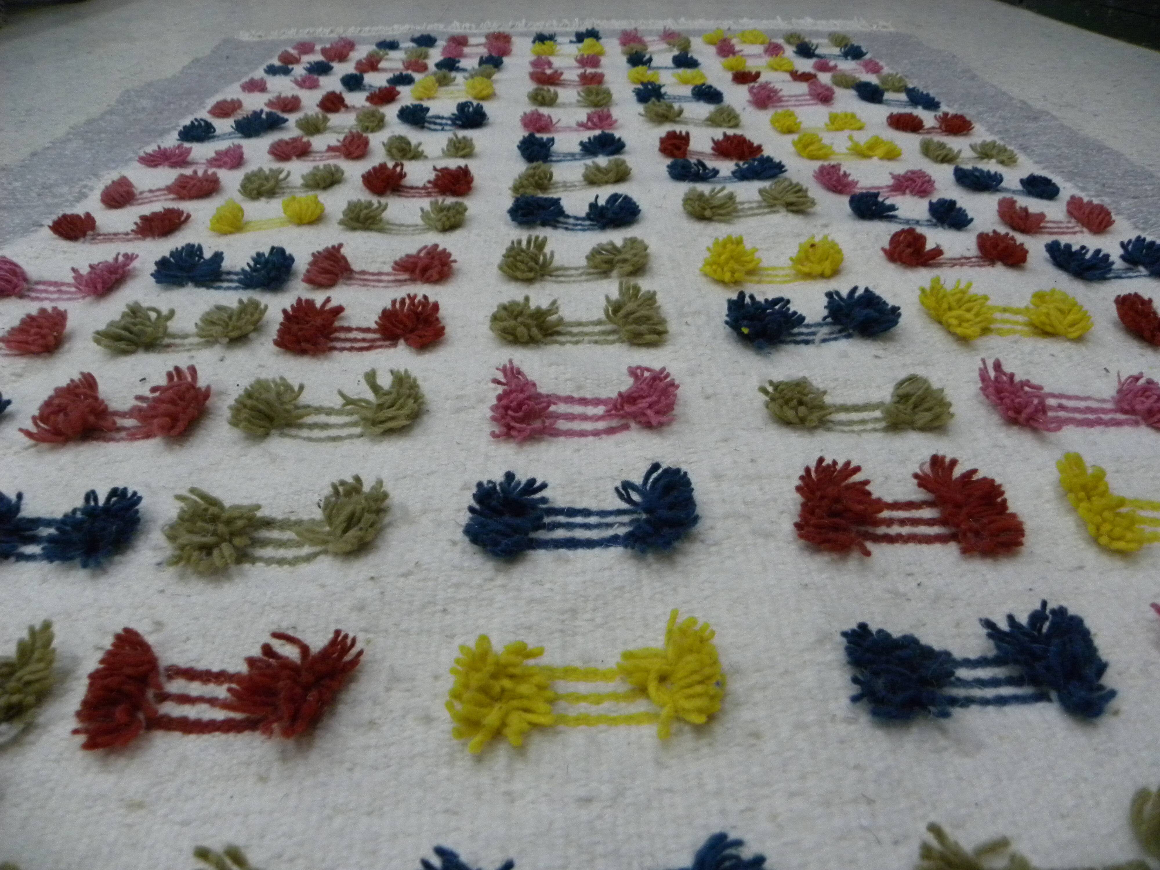 Handwoven Modern Boho Wool Rug with Colourful Patterns and Pompoms
