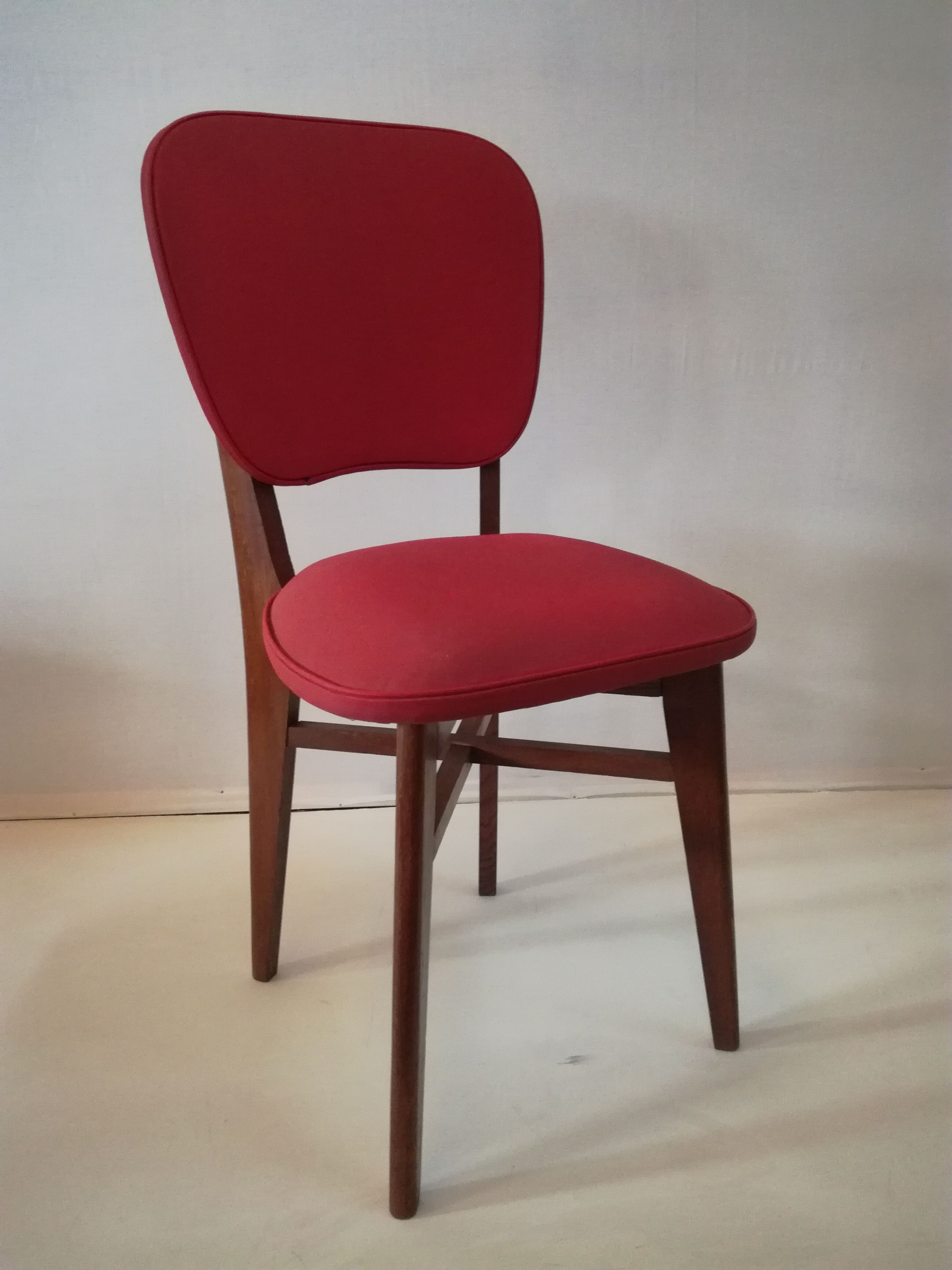 Series of 4 wooden chairs and skai 50s