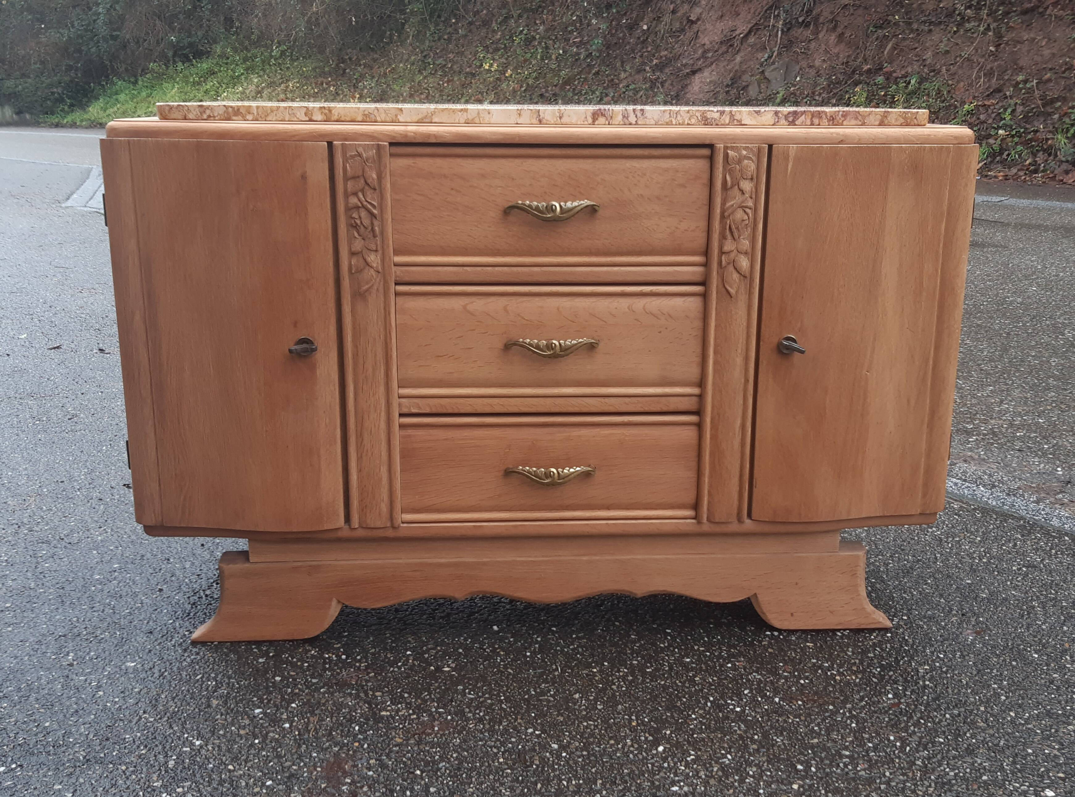 Art Deco buffet in raw oak wood.