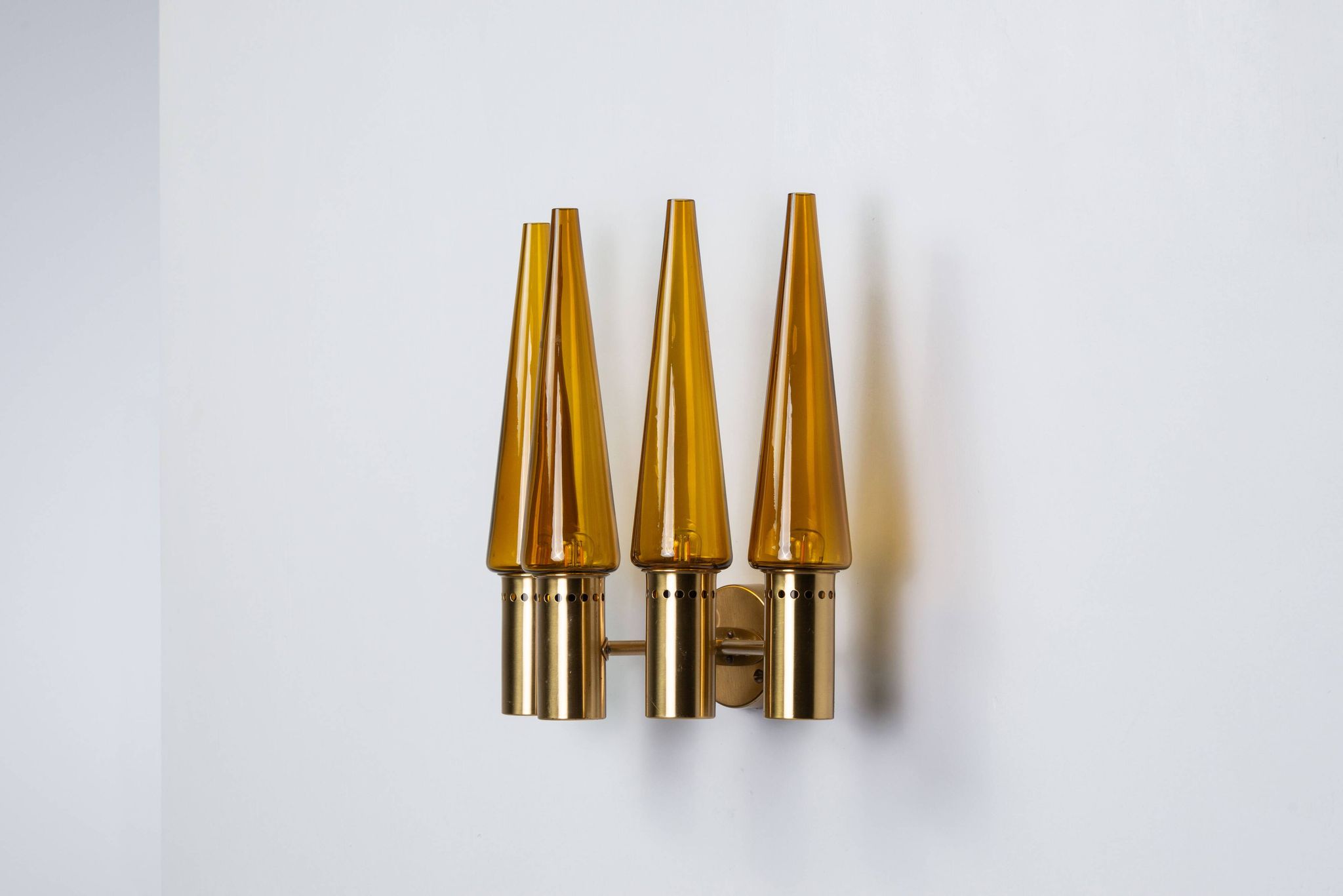 Hans Agne Jakobsson wall lamp made from brass with orange shades