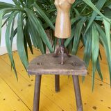 Old wooden tripod stool