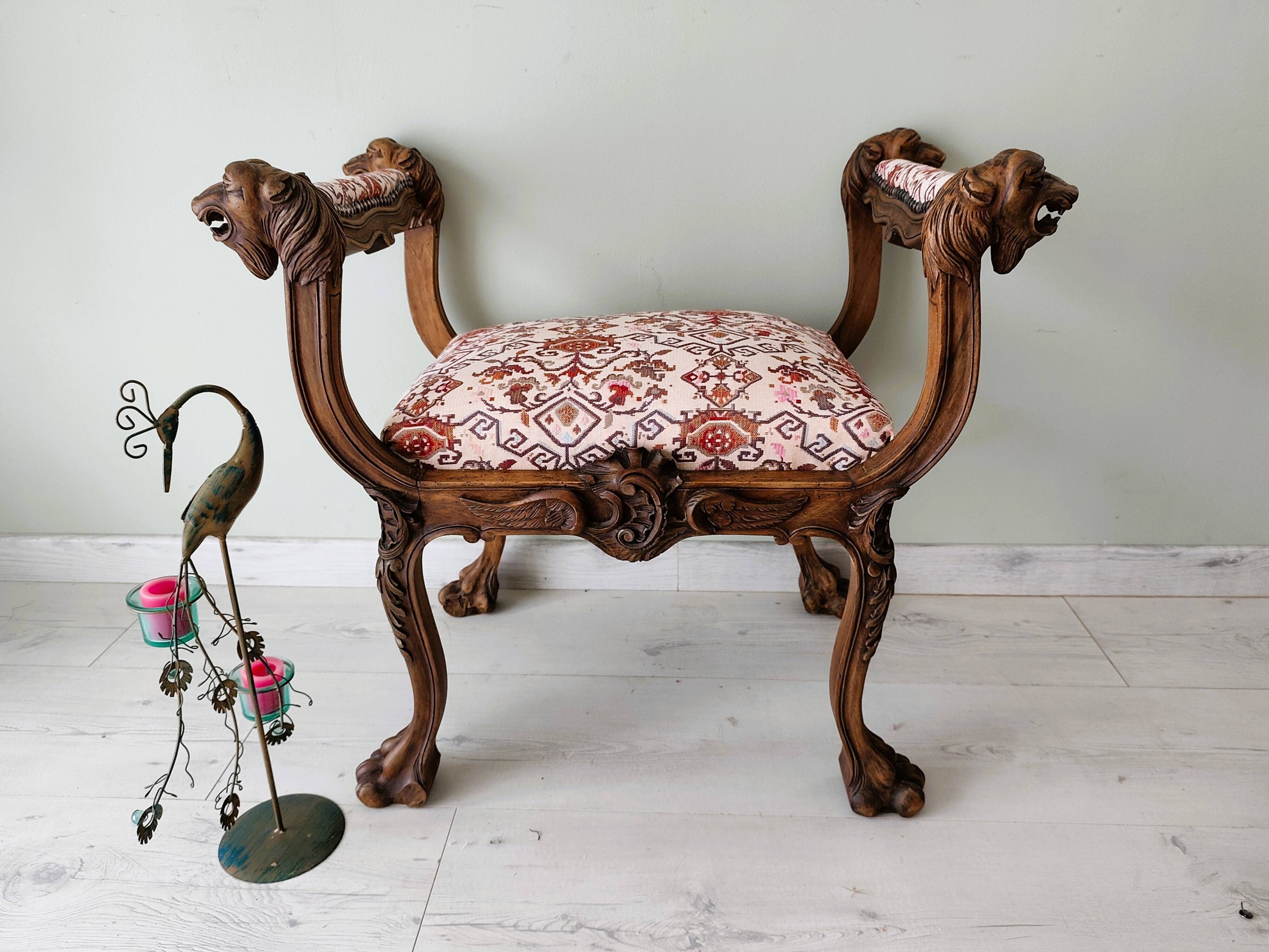 Neo-Renaissance banquette style with lion heads